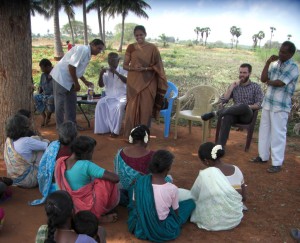 Kyle Pitzer at a women's lending group meeting during his internship in India